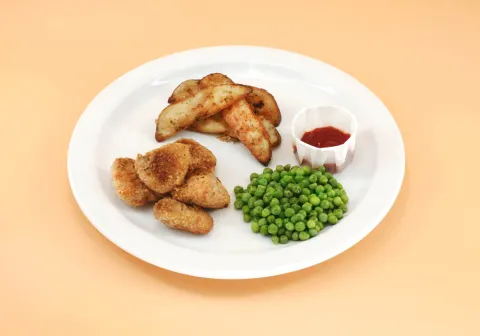 Chicken Nuggets with Wedges & Peas
